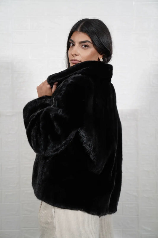 Mink fur jacket black with collar displaying uniform flat black solid pattern surface and hip level silhouette — Greek craftsmanship, TatiFurs