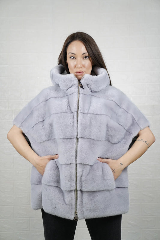 Mink fur cape purple close-up texture showing skin on skin vertical pelt flow and rich dimensional purple mink depth