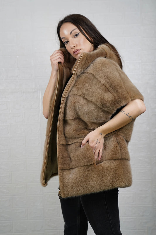 Mink fur cape brown women shown full length from front displaying short sleeved hooded silhouette and warm natural brown skin on skin flow