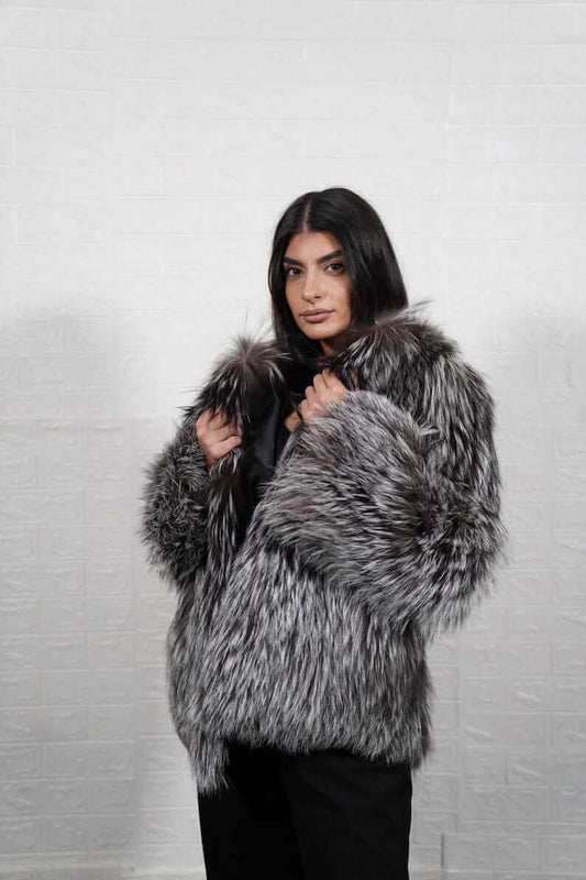Silver Fox Fur Jacket Full Skin - Tatifurs, elegant silver fox fur coat modeled by a woman, showcasing its plush texture.