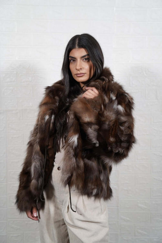 Model wearing natural crystal brown fox fur short jacket coat with collar