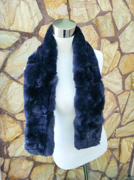 Rex Rabbit Fur Scarf Navy Blue - Tatifurs displayed on a mannequin against a stone background.