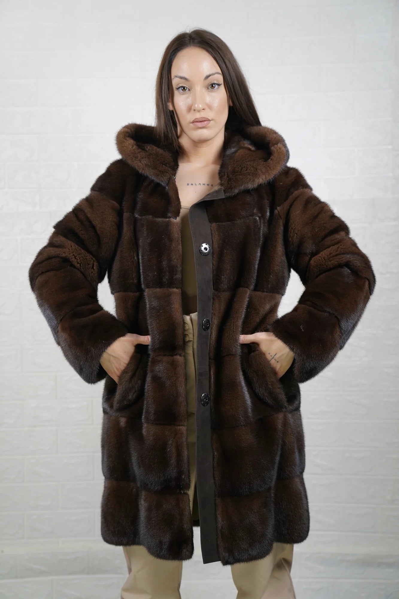 Mink fur coat brown with hood displayed showing deep warm brown tone and full above the knee silhouette — Greek craftsmanship, TatiFurs
