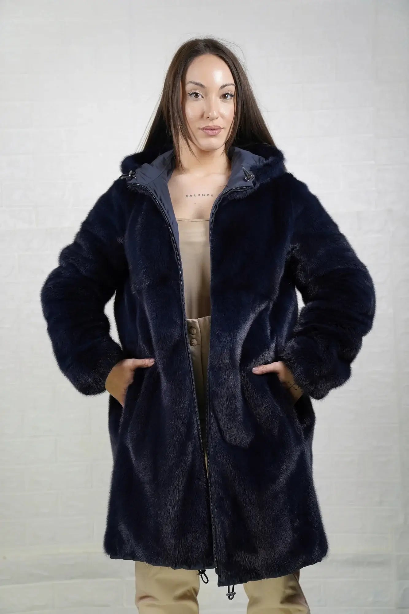 Mink fur coat reversible blue hood worn up showing mink lined hood framing face in deep luminous blue matched to coat body — Greek craftsmanship, TatiFurs
