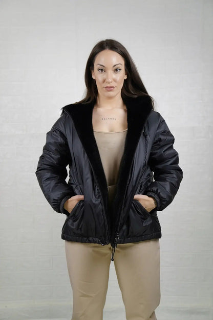Mink fur jacket reversible black hood worn up showing mink lined hood framing face in deep black matched to coat body — Greek craftsmanship, TatiFurs
