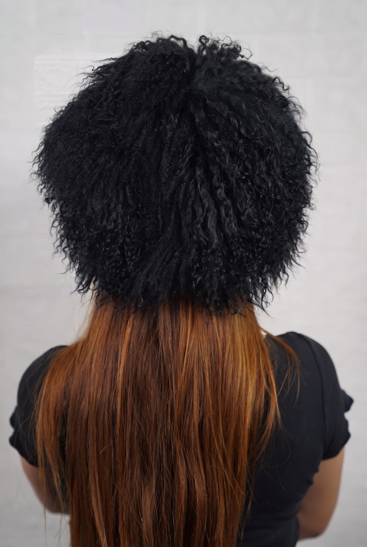 Mongolian Sheepskin Hat Black — Curly Lamb Fur, One Size shown from the back, dense deep jet black Mongolian sheepskin pile from crown to nape — TatiFurs
