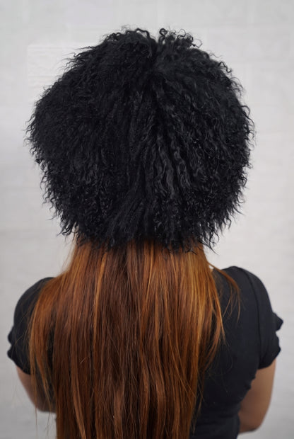 Mongolian Sheepskin Hat Black — Curly Lamb Fur, One Size shown from the back, dense deep jet black Mongolian sheepskin pile from crown to nape — TatiFurs