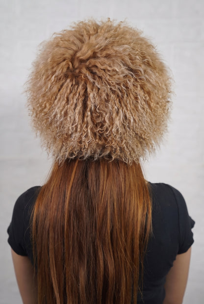 Mongolian Sheepskin Hat Camel Brown — Curly Lamb Fur, One Size shown from the back, dense warm natural camel brown Mongolian sheepskin pile from crown to nape — TatiFurs