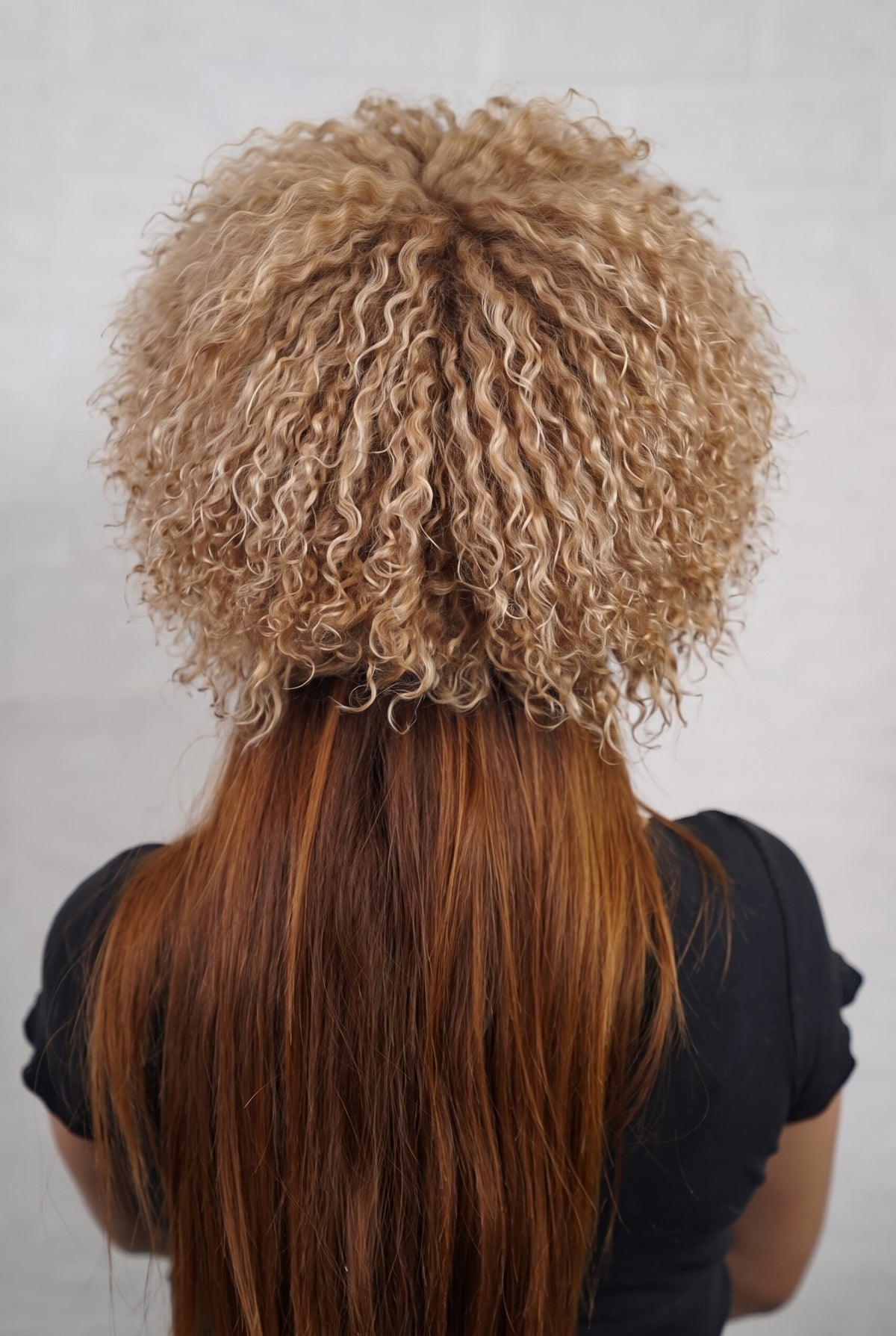 Mongolian Sheepskin Hat Light Brown — Curly Lamb Fur, One Size shown from the back, dense milky caramel light brown Mongolian sheepskin pile from crown to nape — TatiFurs