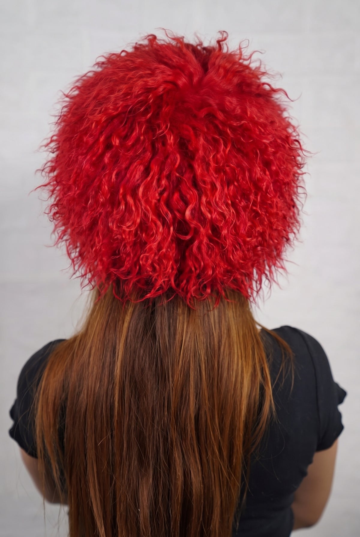 Mongolian Sheepskin Hat Red — Curly Lamb Fur, One Size shown from the back, dense vivid scarlet red Mongolian sheepskin pile from crown to nape — TatiFurs