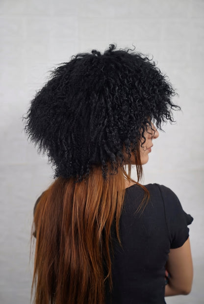 Mongolian Sheepskin Hat Black — Curly Lamb Fur, One Size three-quarter back view showing the deep jet black curls covering the crown and nape — Greek craftsmanship, TatiFurs