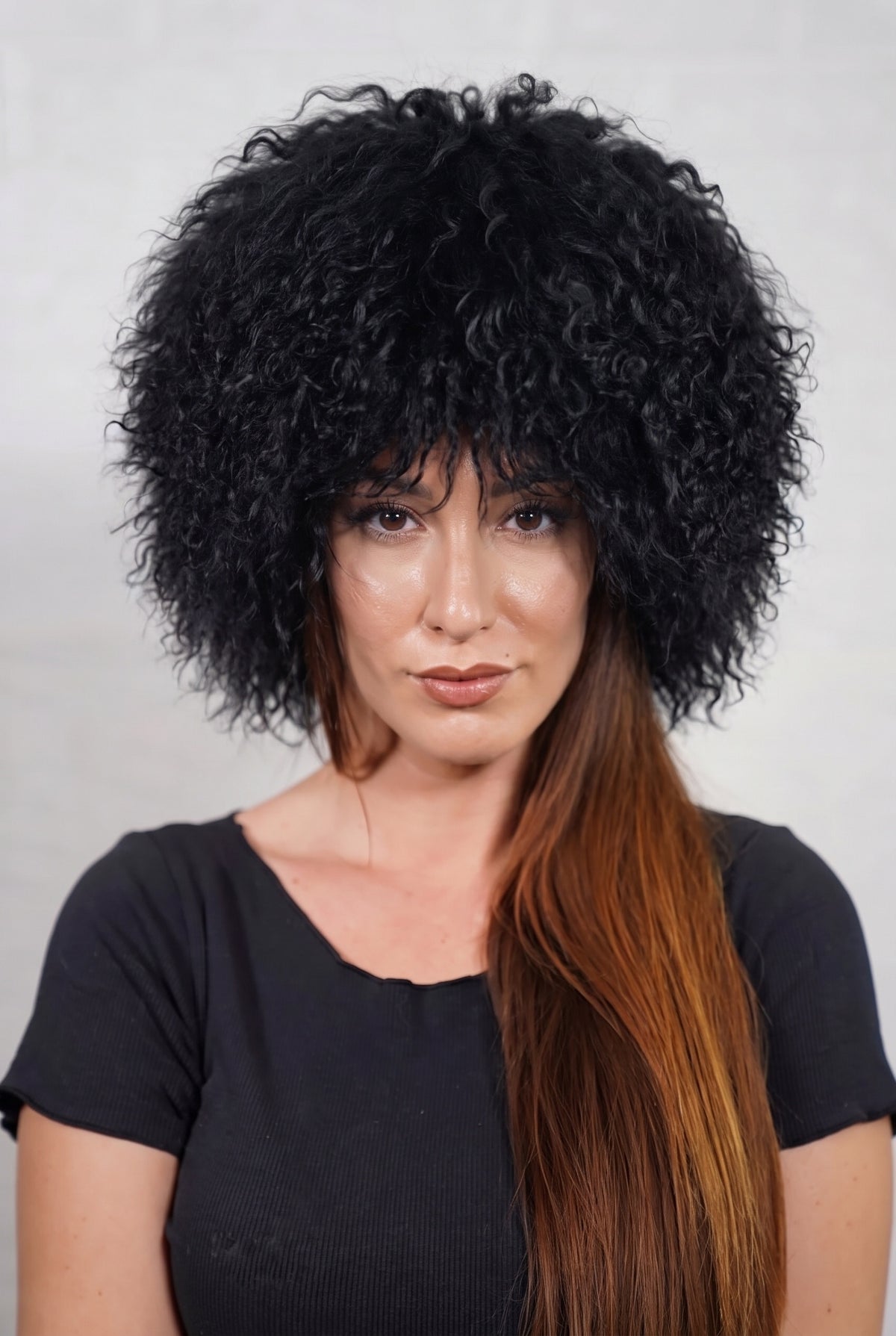 Mongolian Sheepskin Hat Black — Curly Lamb Fur, One Size shown from the front, full round silhouette of deep jet black Mongolian lamb curls over the forehead — handmade in Greece, TatiFurs