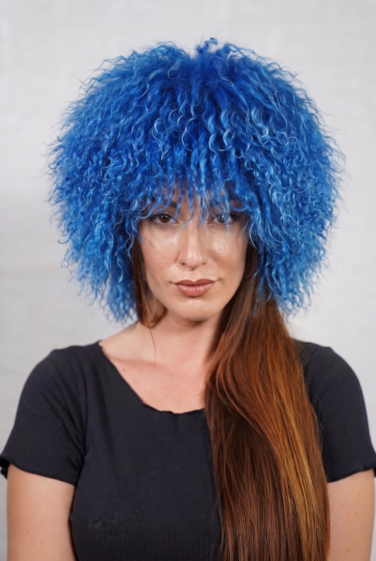 Mongolian Sheepskin Hat Blue — Curly Lamb Fur, One Size shown from the front, full round silhouette of rich cobalt blue Mongolian lamb curls over the forehead — handmade in Greece, TatiFurs