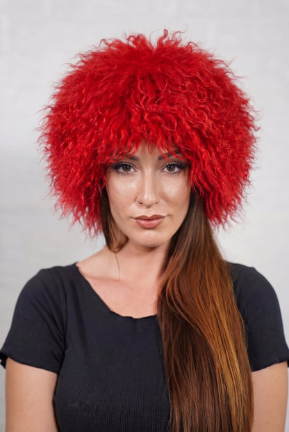 Mongolian Sheepskin Hat Red — Curly Lamb Fur, One Size shown from the front, full round silhouette of vivid scarlet red Mongolian lamb curls over the forehead — handmade in Greece, TatiFurs