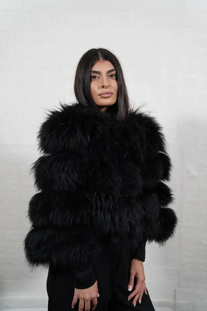 Alpaca fur jacket black displaying black alpaca horizontal rows with clean leather strips and cropped bomber above waist silhouette — Greek craftsmanship, TatiFurs
