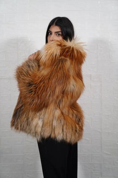 Fox fur jacket gold shown from the back displaying full hip level silhouette and consistent warm radiant gold fox full skin surface — Greek craftsmanship, TatiFurs
