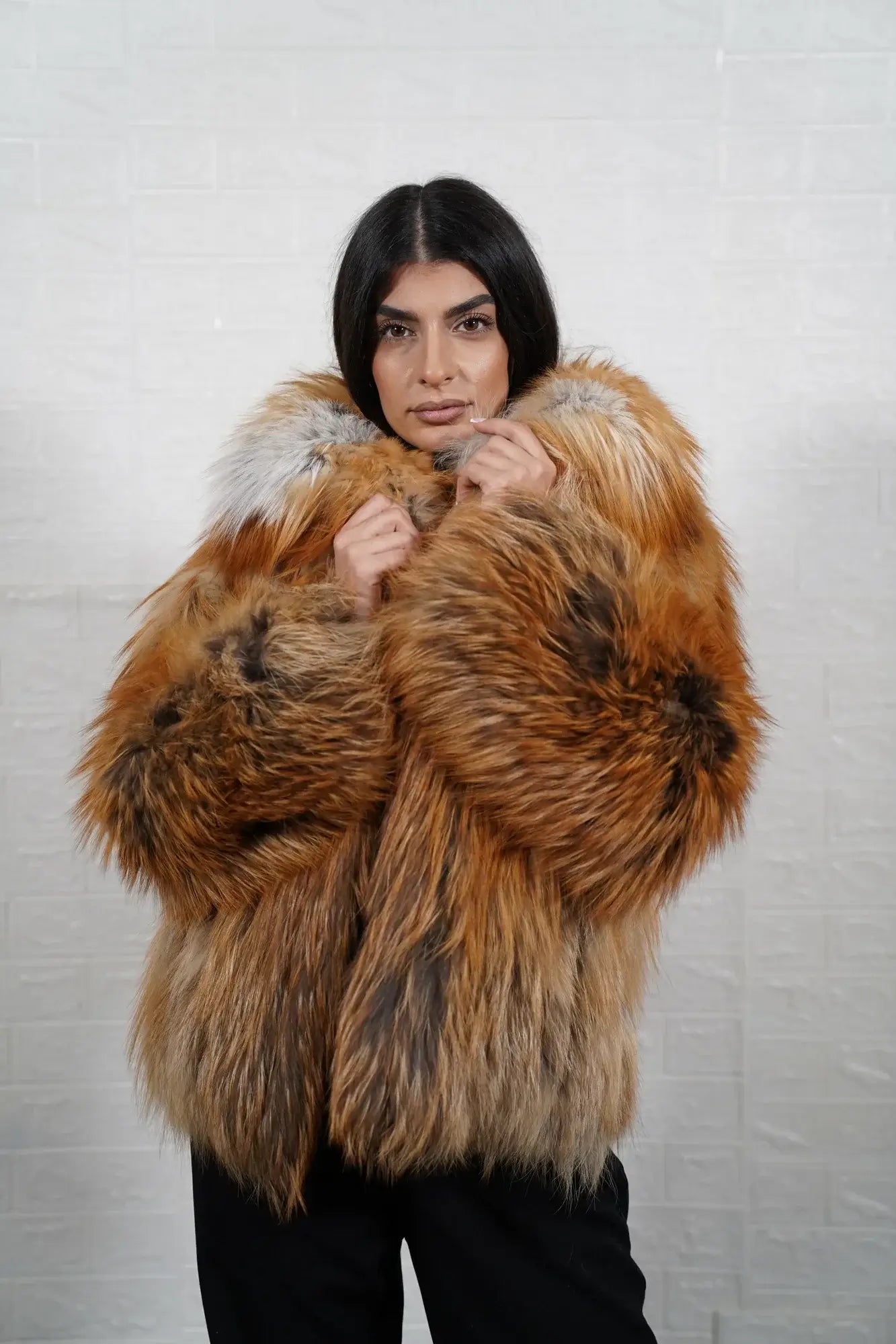 Fox fur jacket gold button closure detail showing clean considered front line on full skin warm gold fox hip level jacket — Greek craftsmanship, TatiFurs
