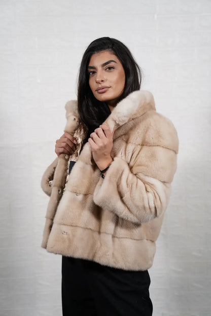 Mink fur jacket pastel beige close-up texture showing skin on skin vertical pelt flow and soft delicate pastel beige mink depth — Greek craftsmanship, TatiFurs

