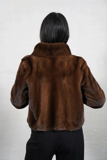 Mink fur jacket brown shown from the back displaying full hip level silhouette and consistent flat brown solid pattern full skin mink — Greek craftsmanship, TatiFurs
