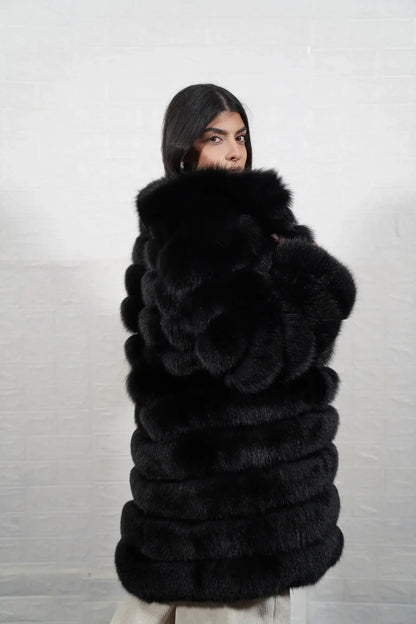 Fox fur coat black leather strip close-up showing clean horizontal leather lines separating full skin black fox fur rows — Greek craftsmanship, TatiFurs
