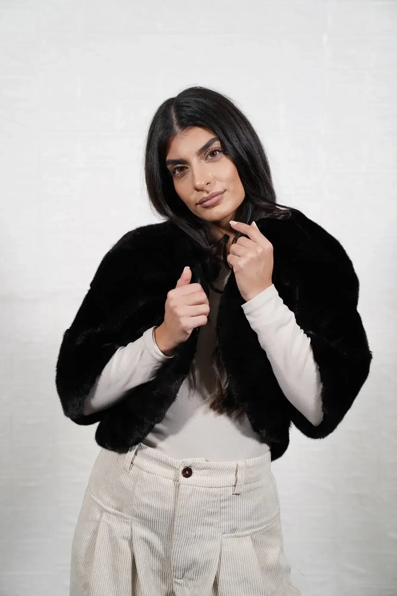 mink fur jacket black — side profile, cropped bomber length, vertical pelt direction — Greek craftsmanship, TatiFurs
