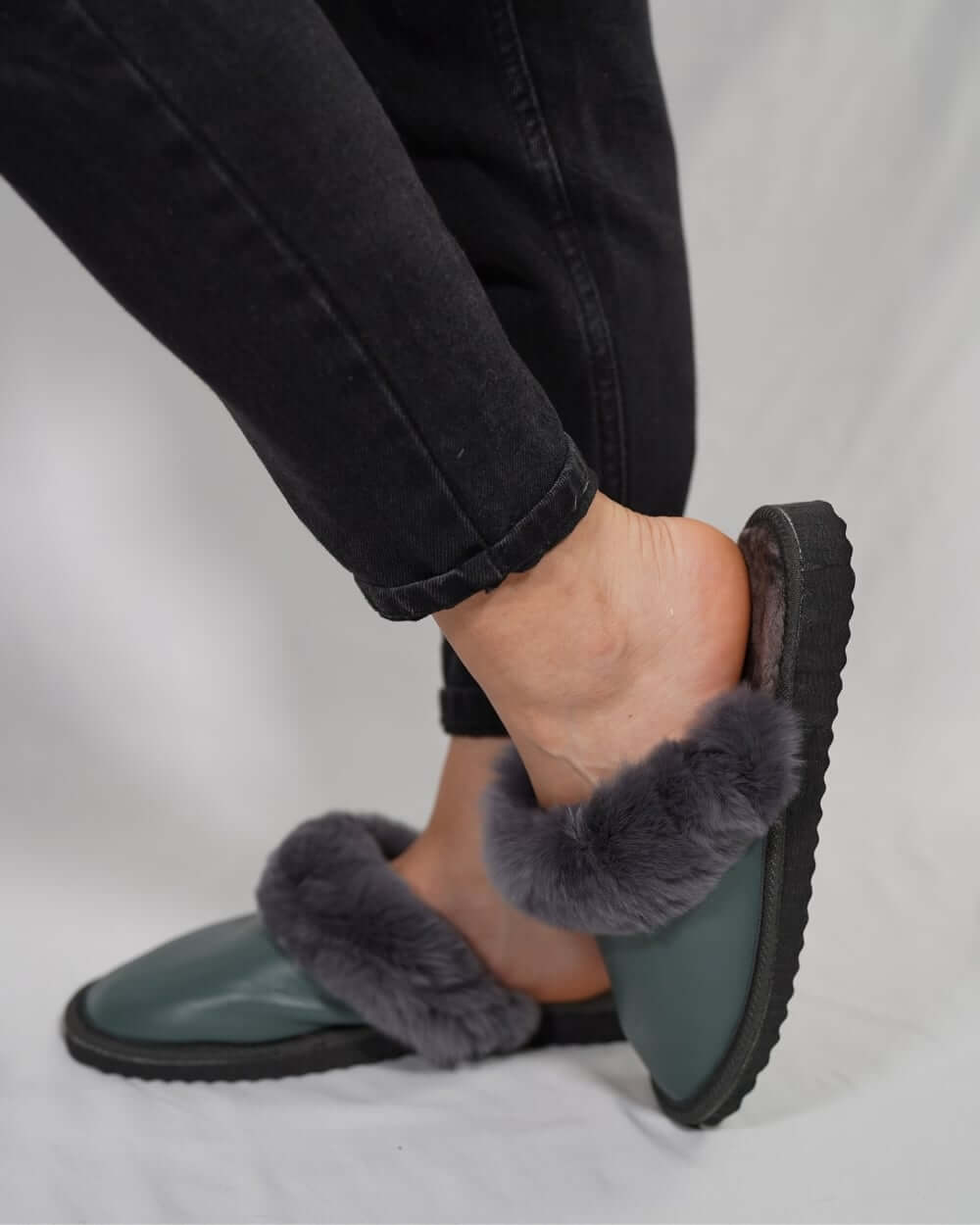Sheepskin Wool Leather Fur Slippers Gray - Tatifurs being worn, showcasing luxurious comfort and style.