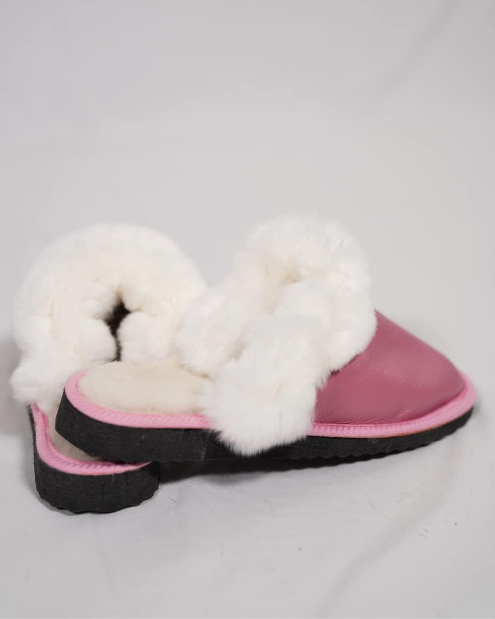 Sheepskin Wool Leather Fur Slippers Pink for Women featuring luxurious soft fur lining and high-quality leather construction.