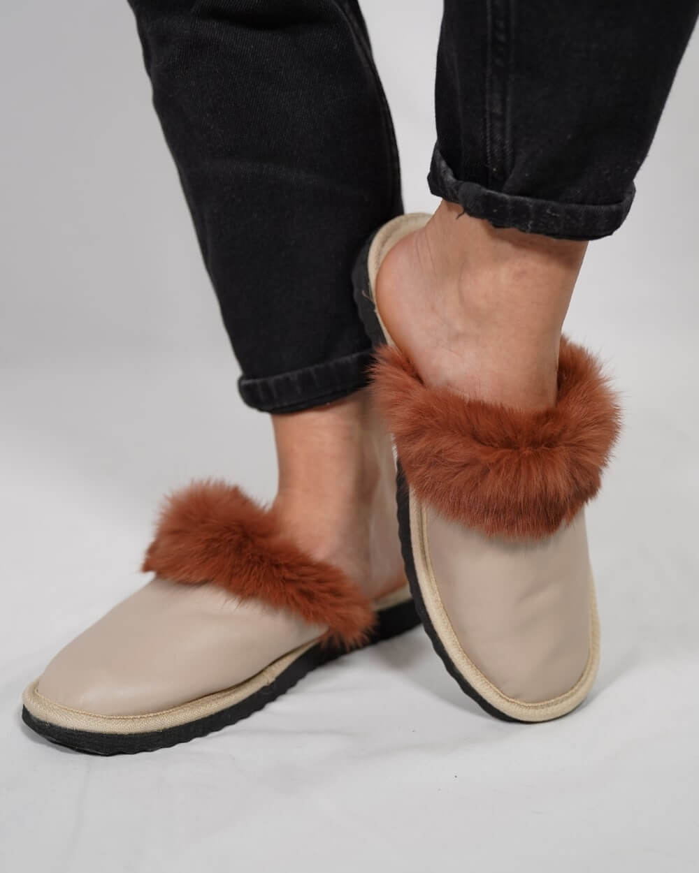 Sheepskin Wool Leather Fur Slippers Beige Powder with stylish faux fur trim and comfortable sole, perfect for home relaxation.