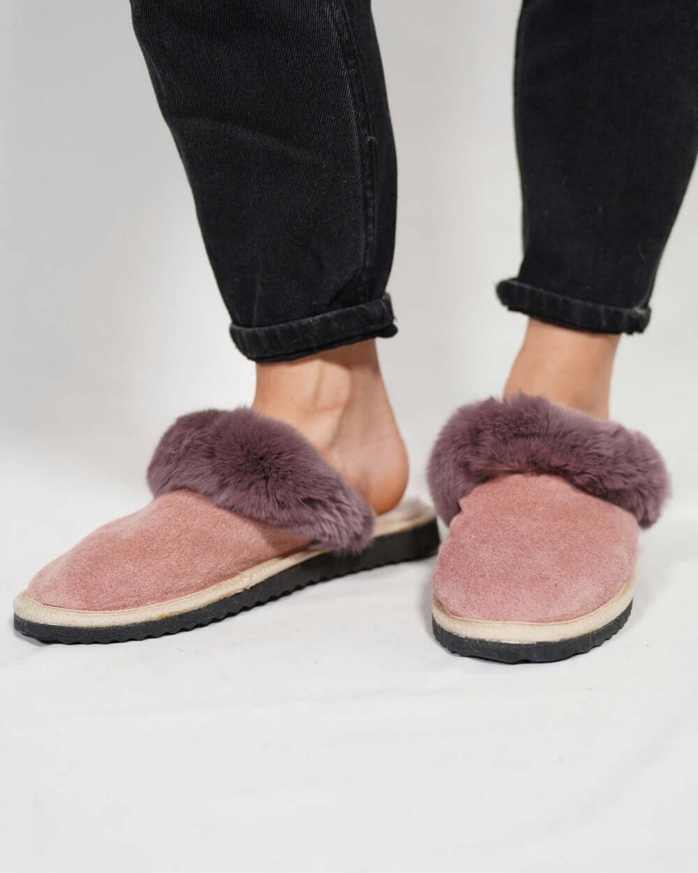 Sheepskin Wool Slippers Baby Pink for Women - Tatifurs worn with a soft fur lining, showcasing comfort and style.