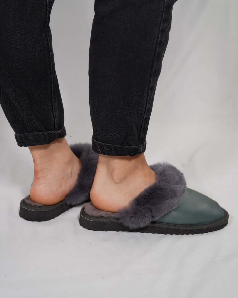 Sheepskin Wool Leather Fur Slippers Gray - Tatifurs worn with black jeans, showcasing premium comfort and style.