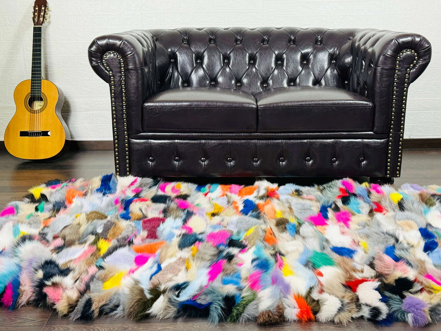Fox Fur Blanket Throw Colorful - Tatifurs displayed on a stylish living room floor with a brown leather couch.