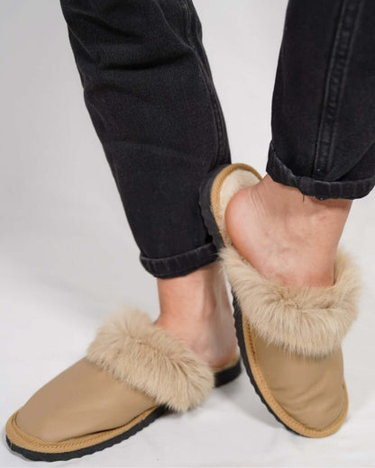 Sheepskin Wool Leather Fur Slippers Camel for Women being worn with casual outfit.
