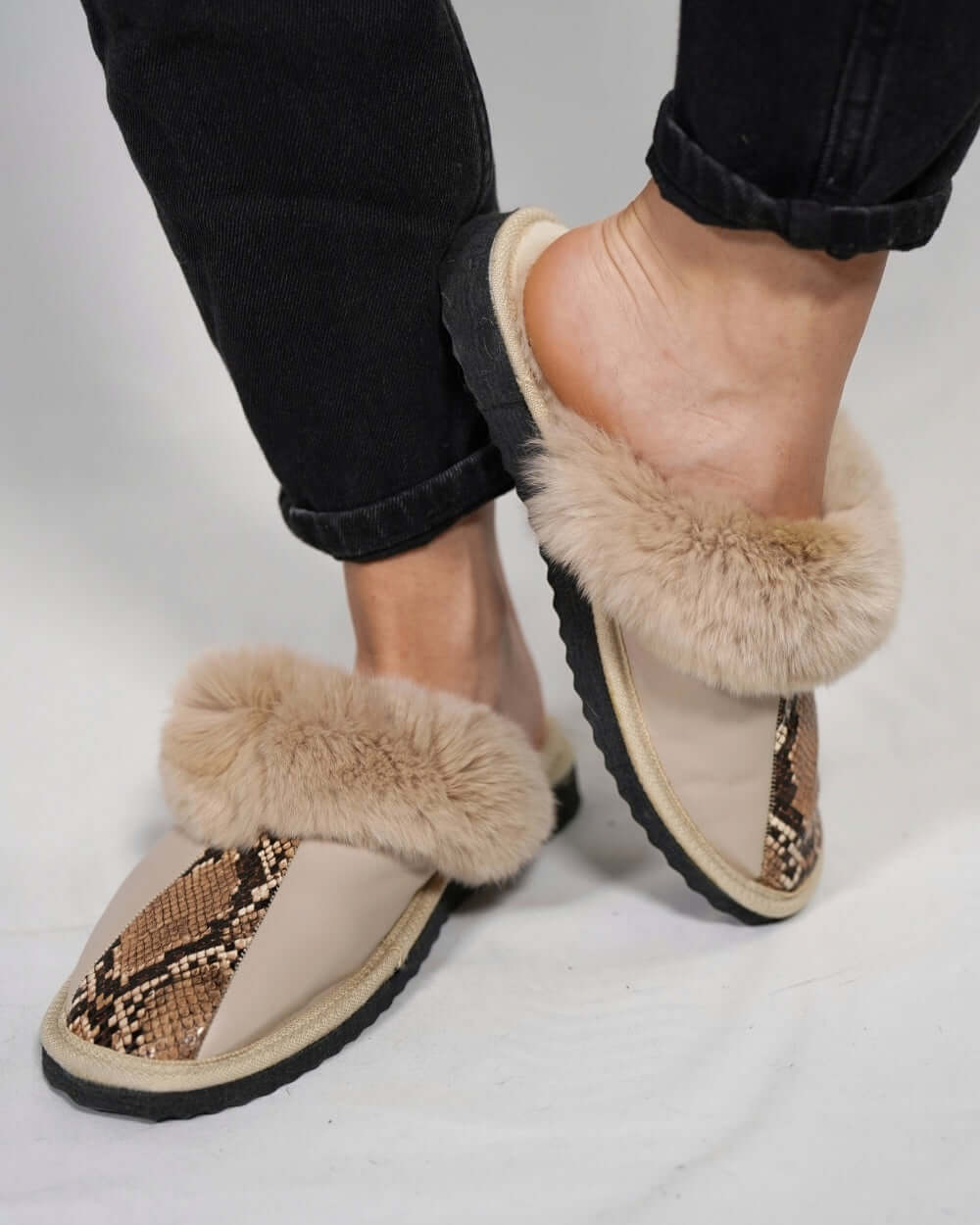 Sheepskin Wool Leather Fur Slippers Beige Leopard worn by a model, showcasing luxurious comfort and style.