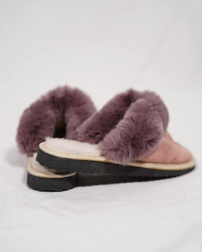 Sheepskin Wool Slippers Baby Pink for Women - Tatifurs resting on a white background, showcasing soft fur lining.