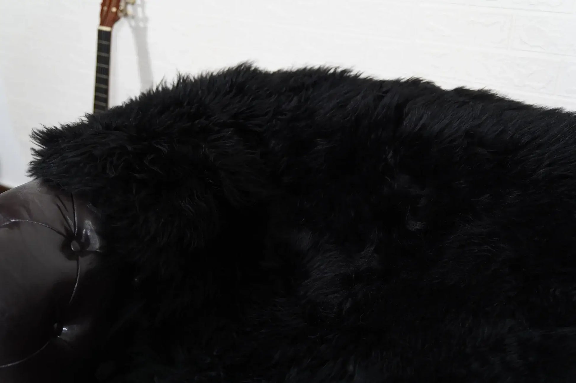 Alpaca throw blanket black velvet cotton backing detail showing smooth warm reverse against commanding black alpaca wool face — Greek craftsmanship, TatiFurs
