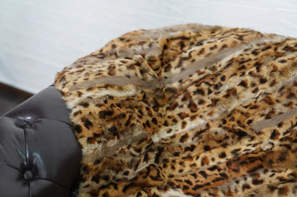 rabbit fur throw blanket leopard print — bold graphic leopard markings, wild pattern surface — Greek craftsmanship, TatiFurs
