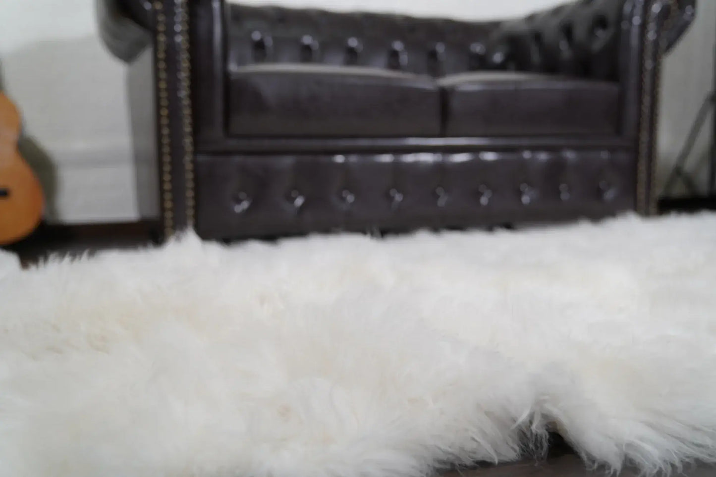 Alpaca throw blanket white close-up texture showing natural white alpaca wool fiber softness and pure luminous tone — Greek craftsmanship, TatiFurs

