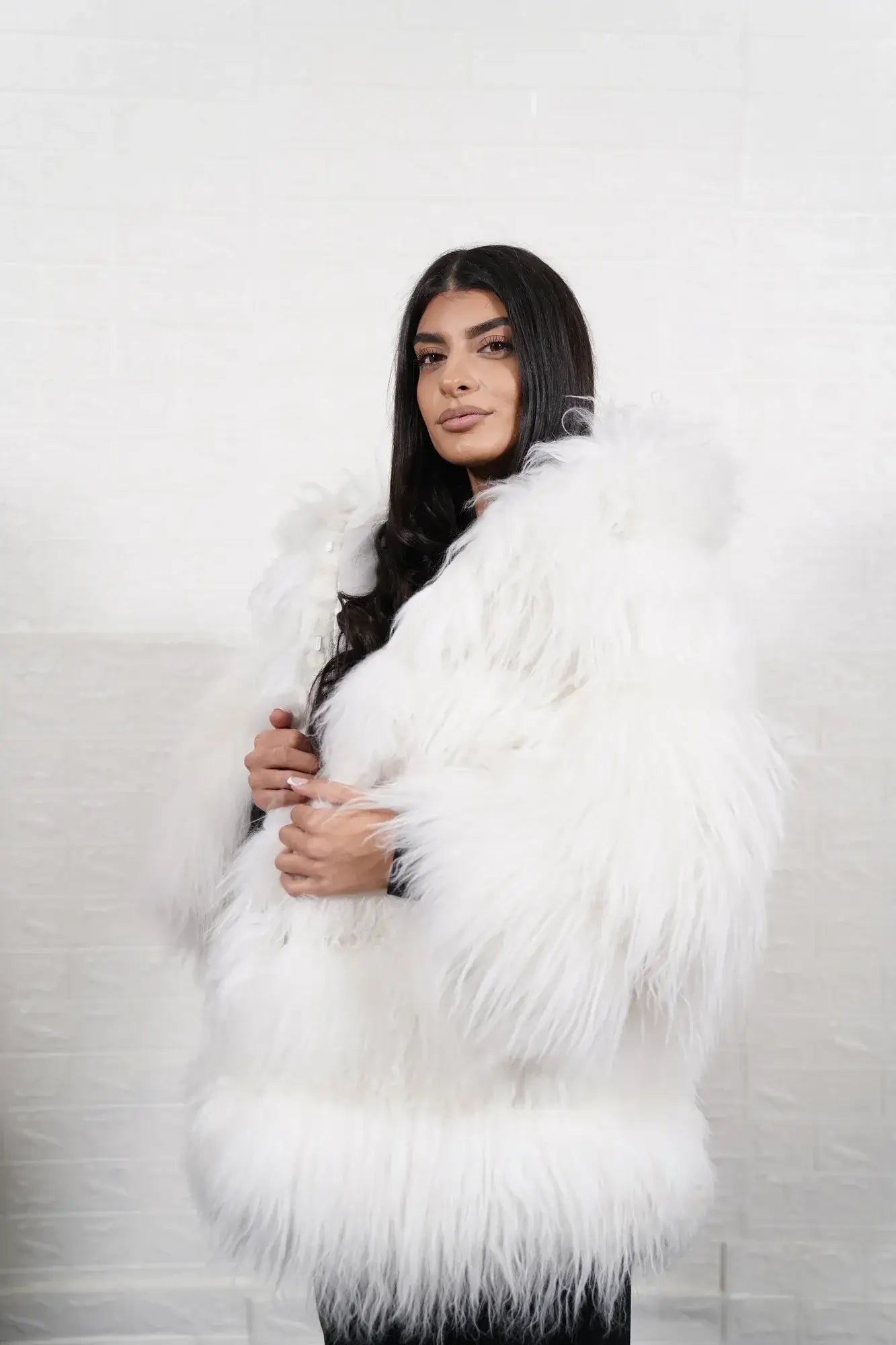 Alpaca jacket white shown from the side displaying below hip silhouette and pure luminous white alpaca natural drape — Greek craftsmanship, TatiFurs
