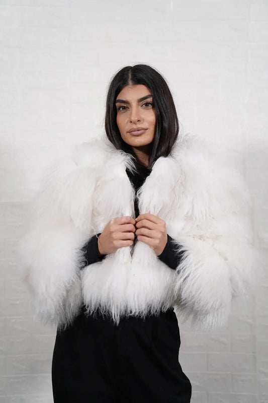Alpaca fur jacket white displaying white alpaca horizontal rows with clean leather strips and cropped bomber above waist silhouette — Greek craftsmanship, TatiFurs
