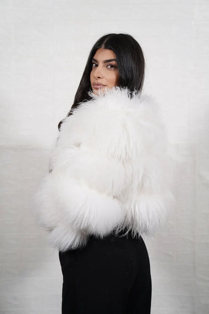 Alpaca fur jacket white women shown full length from front displaying bomber neckline and button closure in horizontal leather framed white alpaca rows — Greek craftsmanship, TatiFurs
