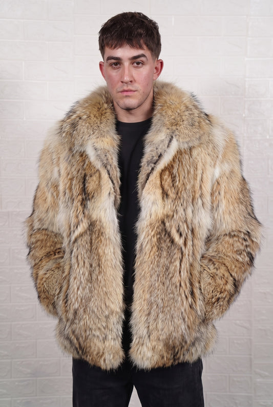 coyote fur jacket men front view showing warm golden tan with cream and dark-tipped guard hairs coyote fur and mid-length silhouette — Greek craftsmanship, TatiFurs