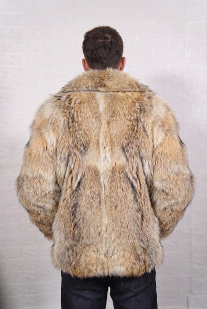 coyote fur jacket men shown from the back displaying full mid-length silhouette and consistent warm golden tan with cream and dark-tipped guard hairs pile — Greek craftsmanship, TatiFurs