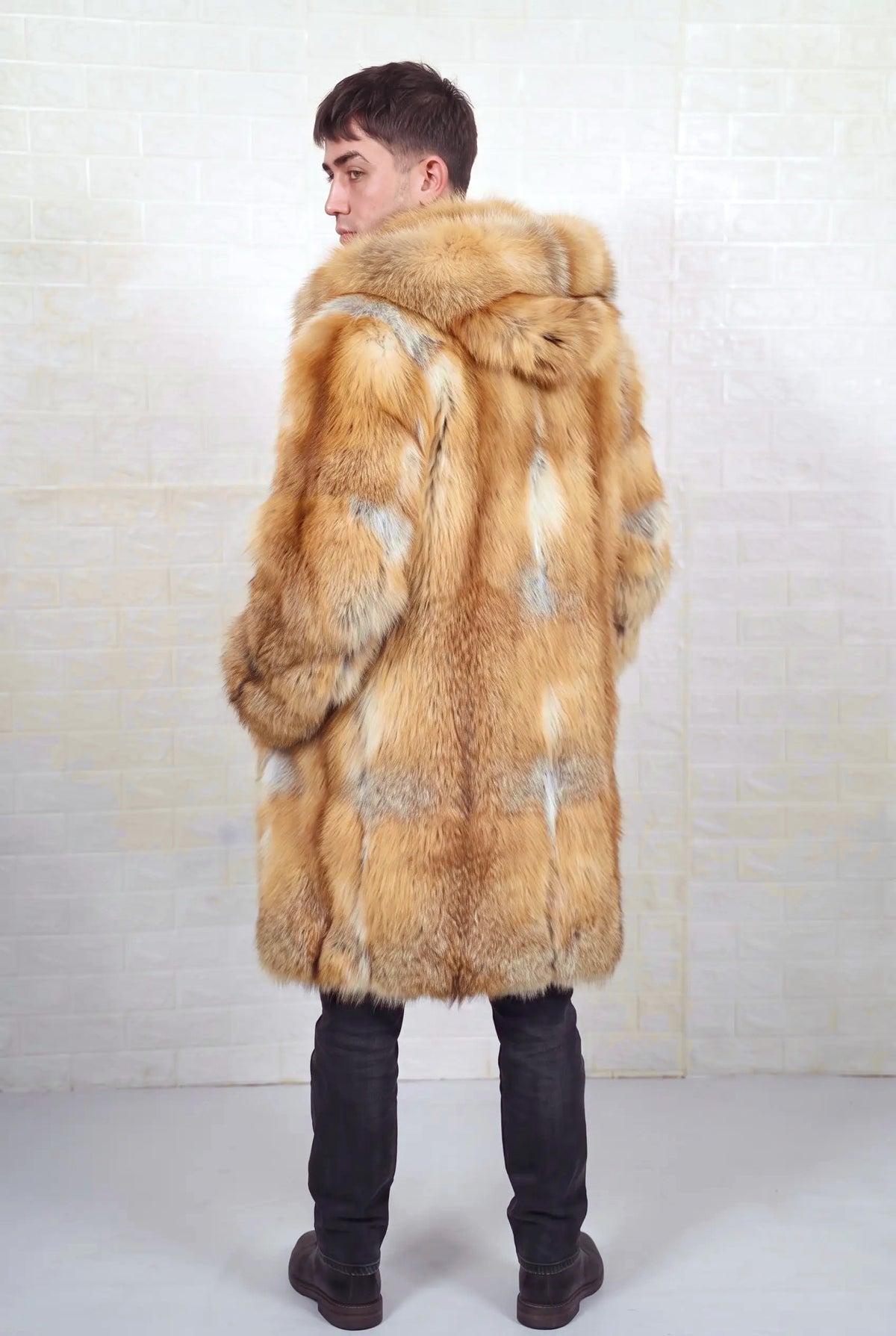 fox fur coat men natural golden three-quarter back view over the shoulder displaying natural golden fox, warm amber-gold with cream and pale silver highlights fox fur and the fur hood — Greek craftsmanship, TatiFurs