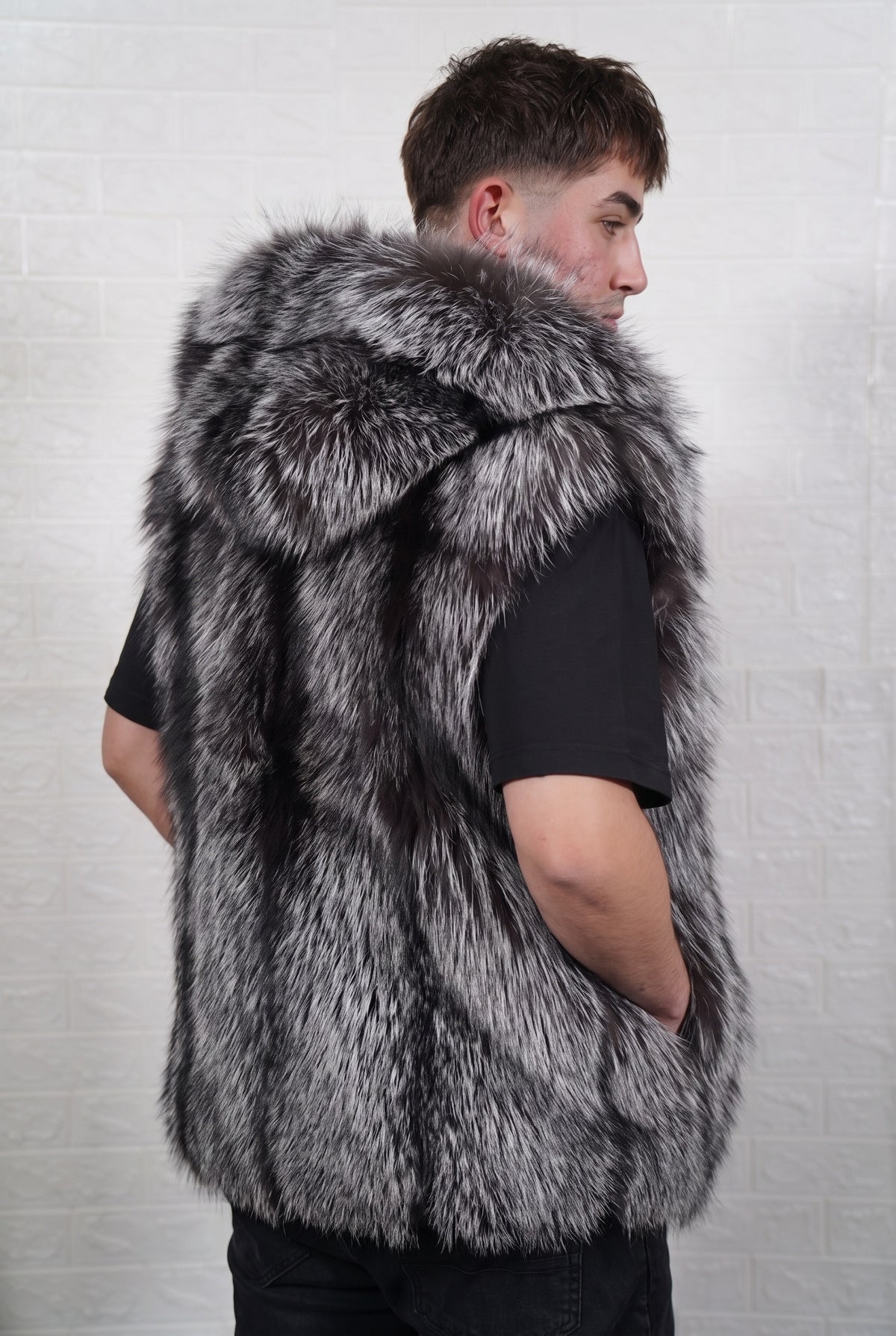fox fur vest men natural silver three-quarter back view over the shoulder displaying natural silver fox, black base with silver-white tips fox fur — Greek craftsmanship, TatiFurs