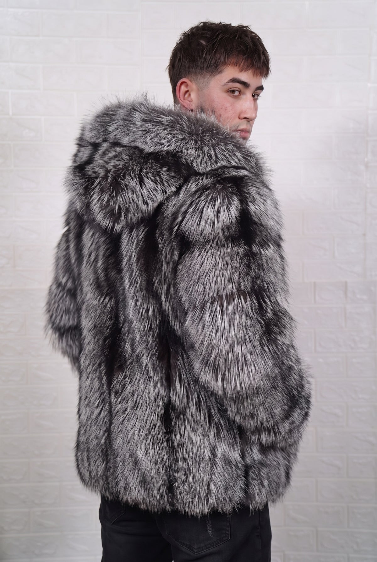 fox fur jacket men natural silver three-quarter back view over the shoulder displaying natural silver fox, black base with silver-white tips fox fur — Greek craftsmanship, TatiFurs