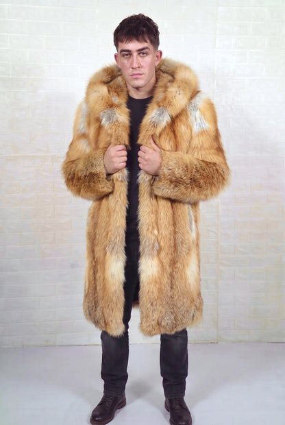 fox fur coat men natural golden front view with both hands on the fur hood worn as a shawl collar showing natural golden fox, warm amber-gold with cream and pale silver highlights fox fur — TatiFurs