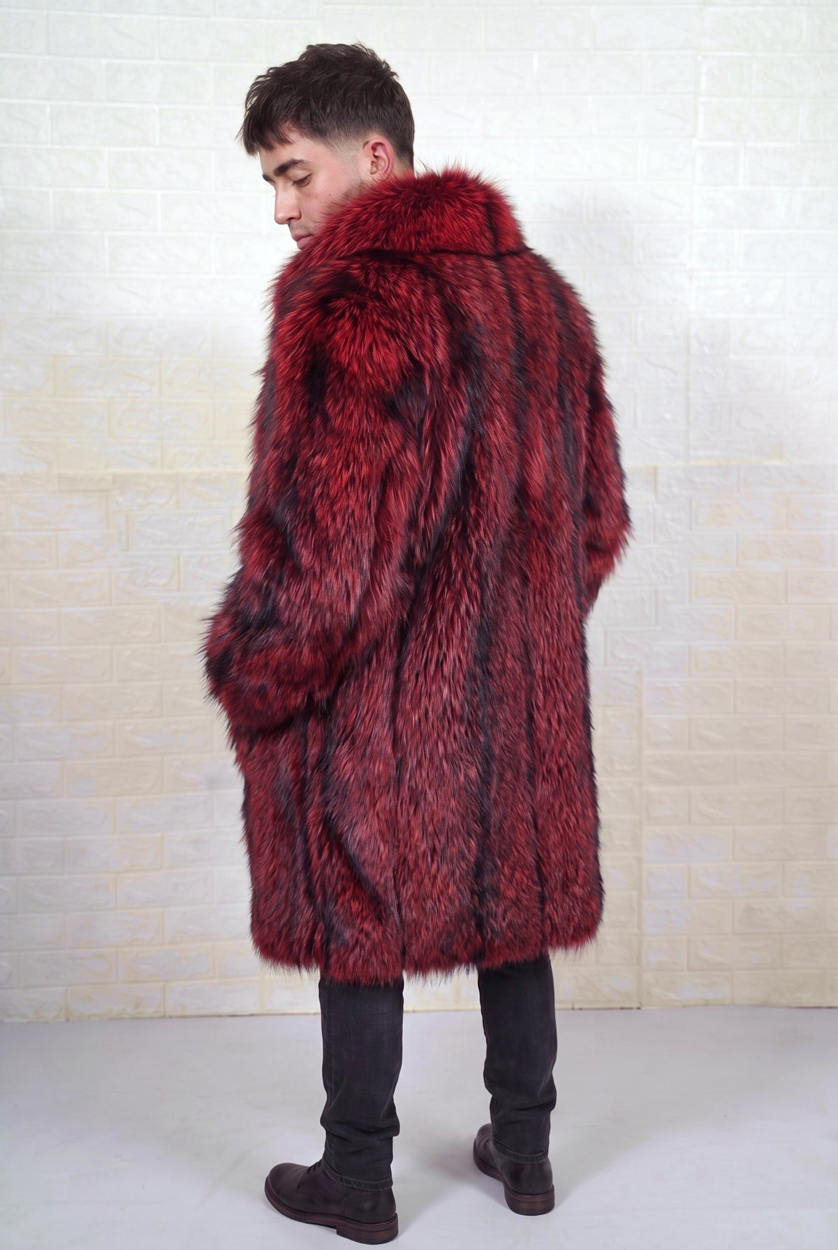 fox fur coat men red black back three-quarter view with collar turned up showing long silhouette in deep crimson over jet black fox fur — Greek craftsmanship, TatiFurs