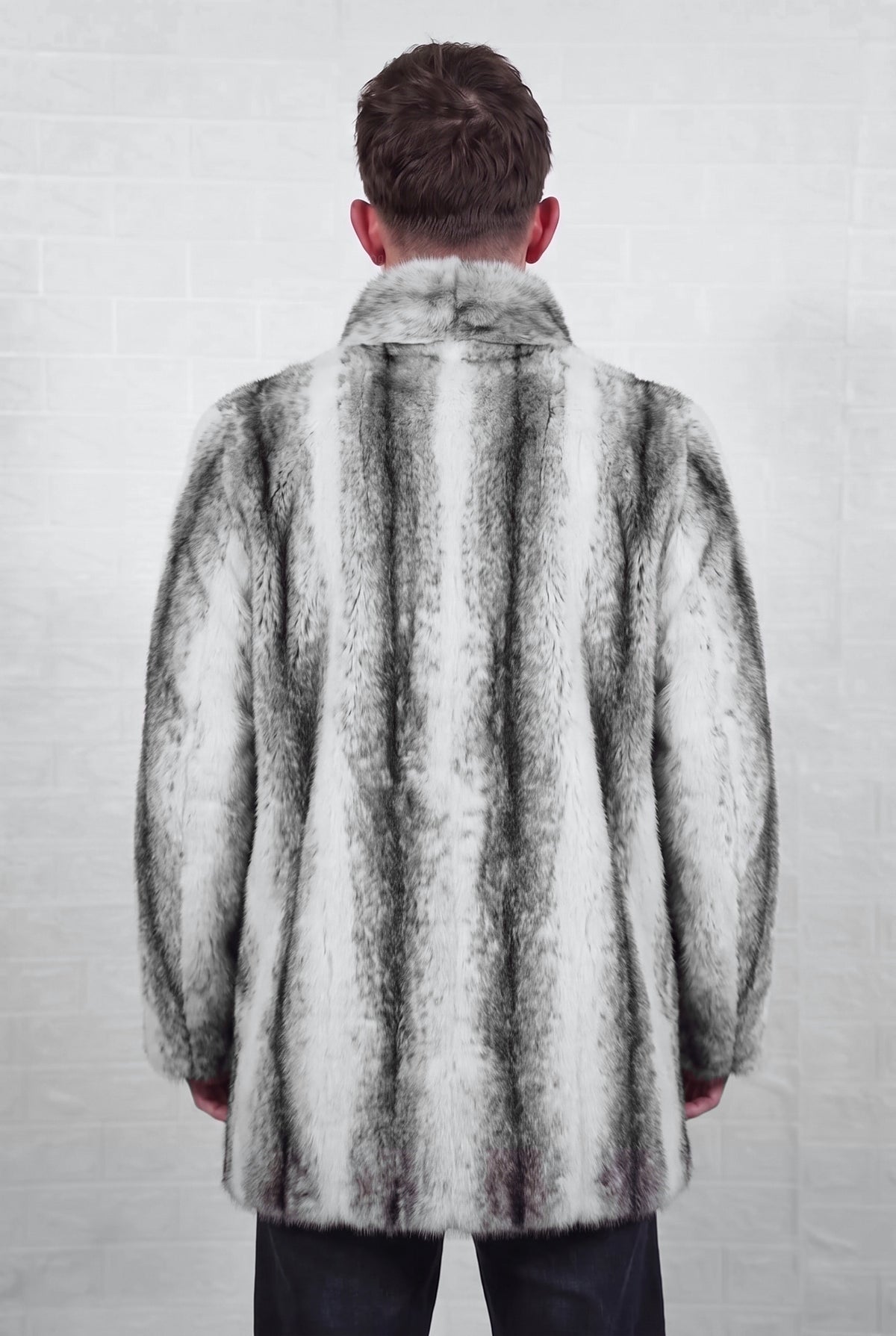 mink fur jacket men black cross shown from the back displaying the full mid length silhouette and even snow white mink with soft feathered charcoal cross stripes down every pelt — Greek craftsmanship, TatiFurs