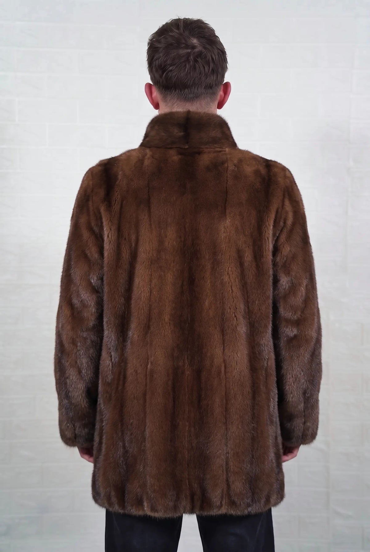 mink fur jacket men brown demi buff shown from the back displaying the full mid length silhouette and even warm brown demi buff mink with a golden-chestnut glow and darker guard hair — Greek craftsmanship, TatiFurs