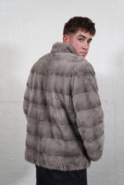mink fur jacket men natural gray three-quarter back view looking over the shoulder, cool natural gray mink with a silver sheen and soft darker bands — Greek craftsmanship, TatiFurs